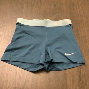 Dark teal Nike pro shorts